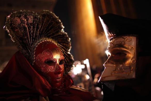 Venice Carnival 11 Masked revellers pose in Saint Marks Square during the Venetian Carnival in Venice