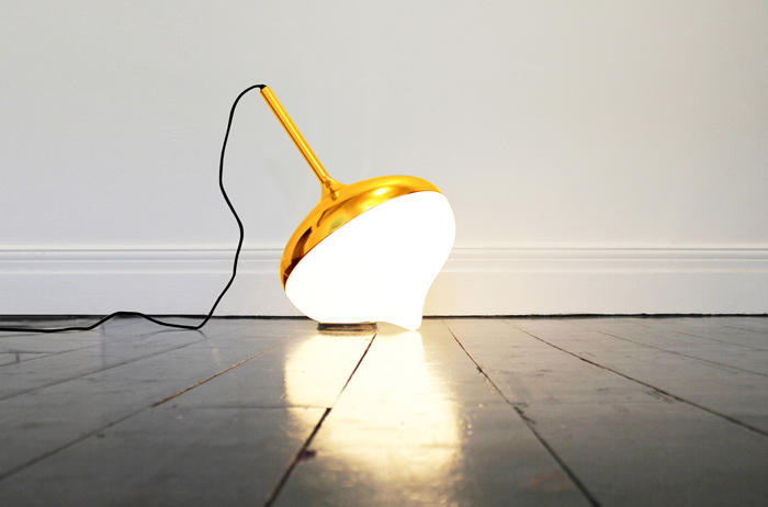 Spun, a lamp that recreates a childhood toy Evie Group yellowtrace 02 Spun, a lamp that recreates a childhood toy