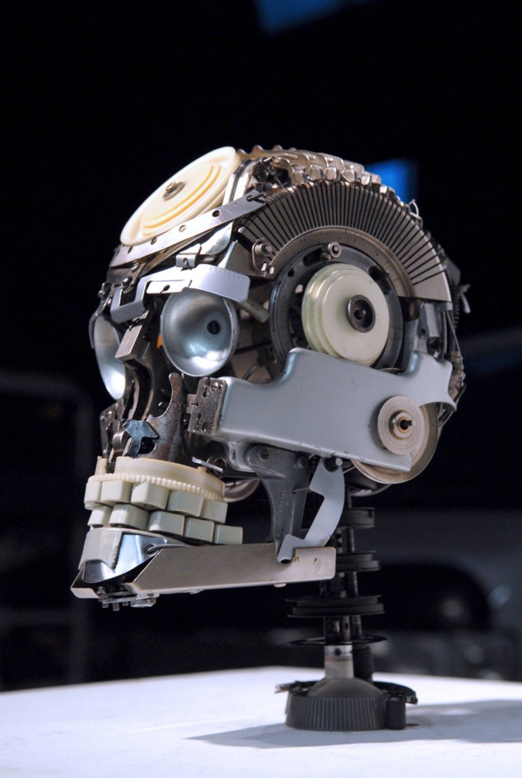 tumblr m47a9mf6hn1qa4vpfo1 1280 750x1117 Jeremy Mayer, the titan of typewriter part sculptures, has sacrificed some more old beasts for a good cause, producing this wonderful 9x12x15 skull. 