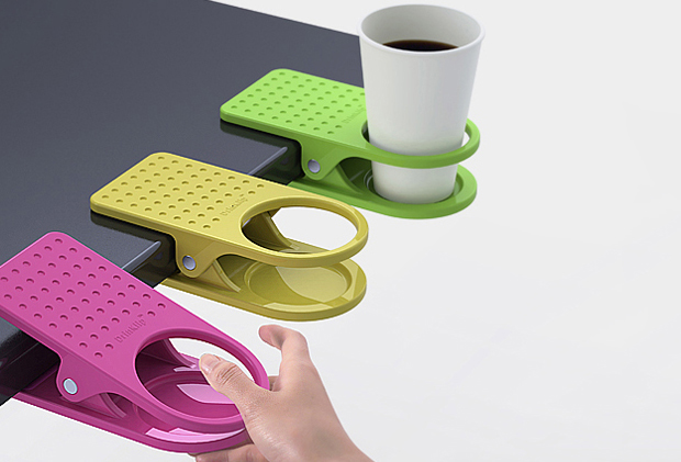 DrinKlip, an easy way of holding your drink in small spaces DrinKlip, an easy way of holding your drink in small spaces