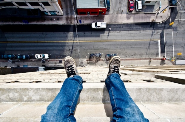 Daredevil Photographer Dangles Off the Edge i1b51 Daredevil Photographer Dangles Off the Edge