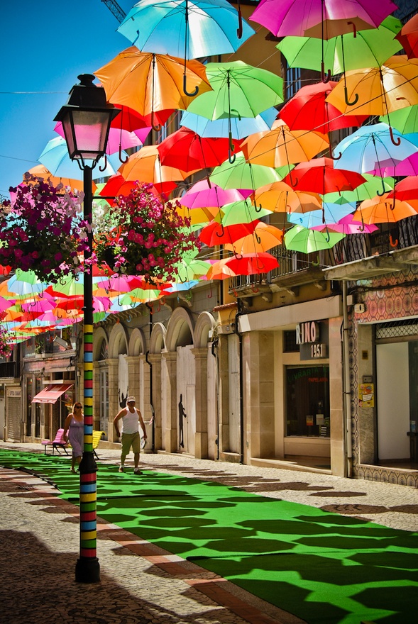  Colorful Umbrellas Magically Float in Mid Air