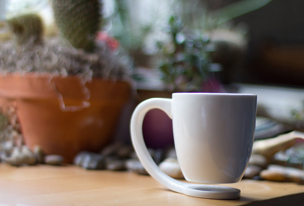Floating Mug, a no coaster necessary mug to prevent marks photo full Floating Mug, a no coaster necessary mug to prevent marks