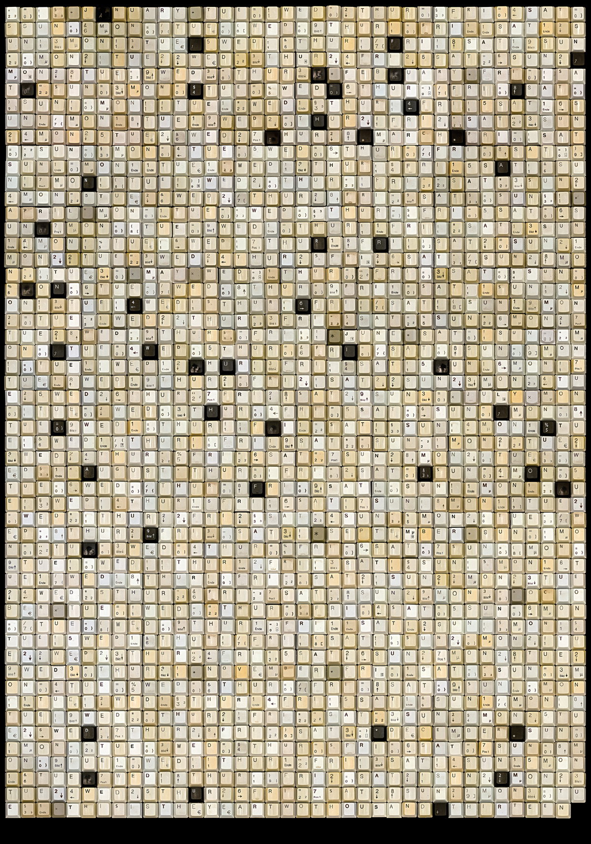 Typographic Wall Calendar made of 2000 and 13 used keyboard keys. 2013 Typographic Wall Calendar by Harald Geisler 1200px wide Typographic Wall Calendar made of 2000 and 13 used keyboard keys.