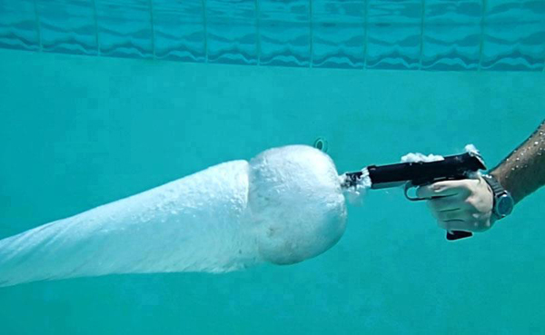 What It Looks Like When You Fire A Gun Under Water What It Looks Like When You Fire A Gun Under Water