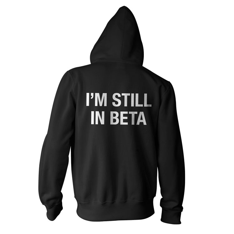 STILL IN BETA AA ZIP HOODIE1 “Im Still In Beta” American Apparel Unisex Fleece Zip Hoodie by WORDS BRAND™