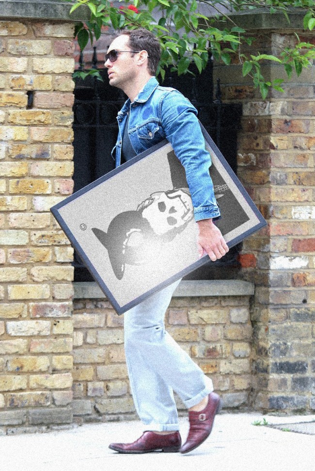 JL 650x971 Jude Law with a print of Luskys Shithead.