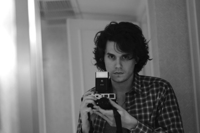 John Mayer with his Leica M8 Silver 650x433 Celebrities with Their Leica Cameras