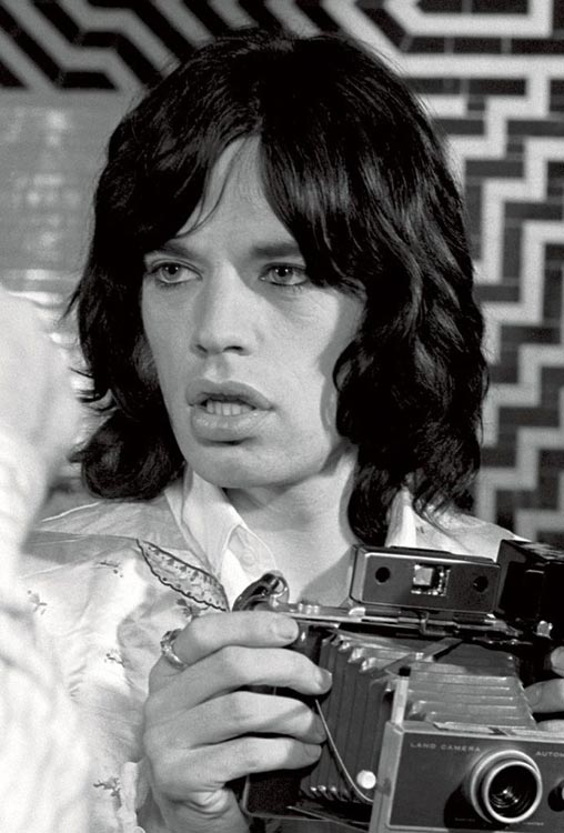 Celebrities with Polaroid In Hand Mick Jagger Celebrities with Polaroid In Hand