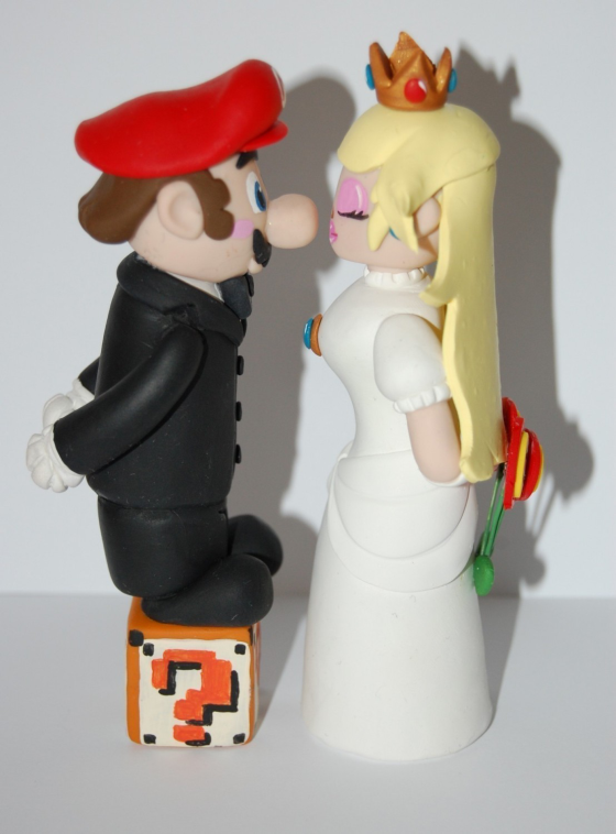 mario and princess peach The coolest wedding cake toppers