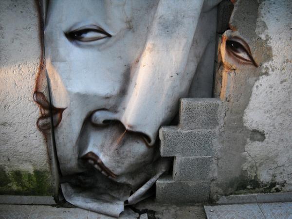 street art brazil 1 Artist Paints Distorted Faces Throughout Streets of Brazil