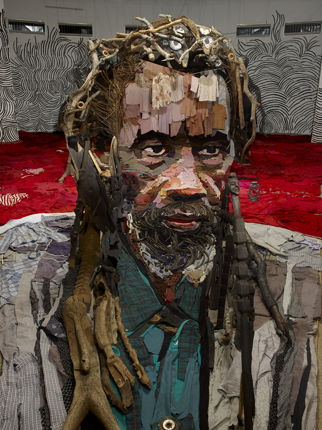 This Anamorphic Portrait by Bernard Pras is Made From an Entire Room of Objects 1130 This Anamorphic Portrait by Bernard Pras is Made From an Entire Room of Objects