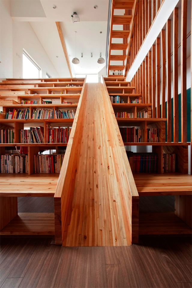 FunFilledHomewithaLibrarySlideDesignedbyMoonHoon Fun Filled Home with a Library Slide Designed by Moon Hoon