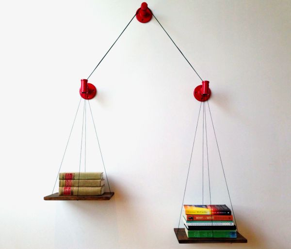 Balance bookshelf by Cush Design Studio Balance bookshelf lets you keep read and unread books separately