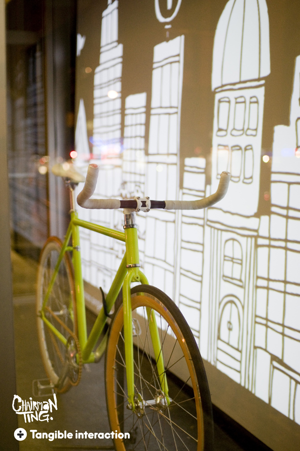 TING BikeWindow2 72dpi pic on Design You Trust TING BikeWindow2 72dpi Fixie window display art installation by Chairman Ting x Tangible Interaction