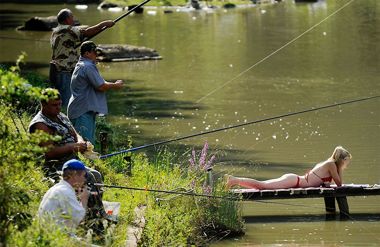 Men Fish Near Black Sea Resort Of Sochi