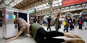 This Stunning Sculpture Of A Giant Lady With Her Head Stuck In A Photo Booth
