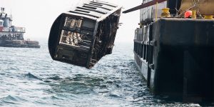 Stunning Photos Showing NYC Subway Cars Being Dumped Into the Ocean
