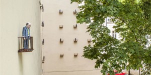 Miniature Cage-like Balconies Attached to a Building