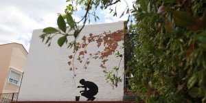 Pejac Paints Mesmerizing 'Eye Trap' Window and Keyhole Illusions on the Streets of Istanbul