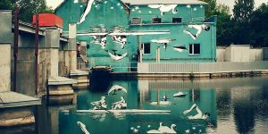 This Mural Was Painted Upside-Down To Reflect Off Of The Water