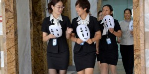 The No-Face Day: Workers In China Wear Masks To Hide Facial Expressions