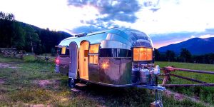 1950s Airstream Trailer Restored as Modern Mobile Home with Cozy Wood Interior