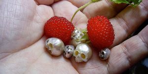 Tiny Oyster Pearls Are Intricately Carved into Wearable Skull Sculptures
