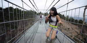Longest Glass Bridge Ever Just Opened in China and Tourists are Terrified to Walk It