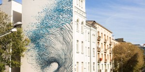 Street Artist DALeast Unveils a New Impressive Mural in Lodz, Poland