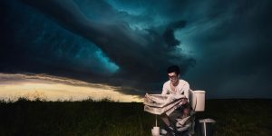 A Powerful Series Of Images Featuring People Carrying Out Everyday Chores In Front Of Giant Storms