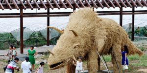 Gigantic Straw Dinosaurs Take Over Chinese Village