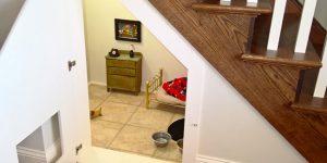 Woman Builds A Tiny Bedroom Under The Stairs For Her Chihuahua