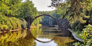 This Jaw-Dropping 19th-Century German Bridge Uses Its Reflection To Form A Perfect Circle