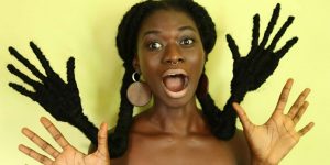 Ivorian Artist Sculpts Her Hair Into Hand Gestures In Stunning Photo Series