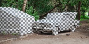 Street Artists Cut The Abandoned Car Out Of Reality