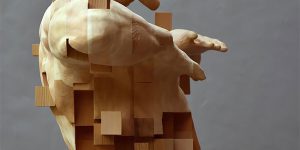Wood Sculptor Creates Sculpture Of A Submerged Man With A Pixelated Glitch