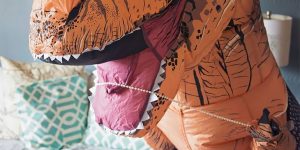 This Woman Had A Humorous 'Sexy' Boudoir Photo Shoot In A T-Rex Costume