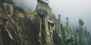 A Magnificent Sculptures By Nature: Otherworldly 'Earth Pyramids' Captured In The Foggy Early Morning Light By Photographer Kilian Schönberger
