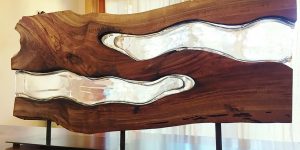 Molten Glass Is Hand Blown Into These Wood Pieces To Make Contemporary Sculptures