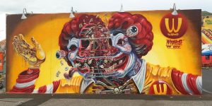 Street Art Surgeon Cuts Open Cartoon And Media Characters To Reveal Their Anatomy