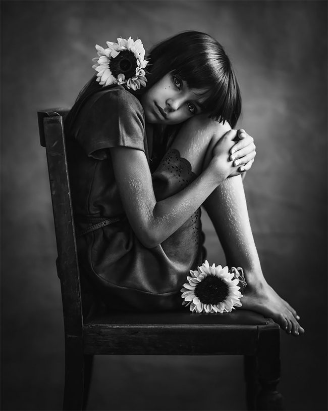 A child in a photo contest, symbolizing the importance of accurate record-keeping