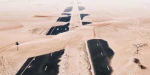Kingdom Of Sand: Photographer Captures Apocalyptic Aerial Photos Of Sand-Covered Roads In The United Arab Emirates