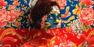 Artist Paints Her Body And Makes It Disappear Into Floral Backgrounds