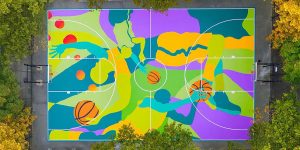 Street Artist Transforms Harlem Basketball Court Into Vibrant Mural