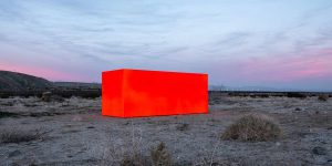 Artist Embeds Giant Neon Orange Monolith Into Coachella Valley's Desert Landscape