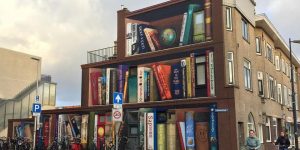 Street Artists Turn Utrecht Apartment Building Into a Giant Bookcase Featuring Residents’ Favorite Books