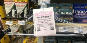 Artist Places ‘At-Home Abortion Kit’ Clothes Hangers In Pharmacies To Protest Abortion Laws