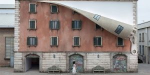 Street Art Sculptor “Unzips” A Building In Milan For Mind-Bending Art Installation