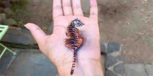 Artist Creates Temporary 3D Paintings On Her Left Hand